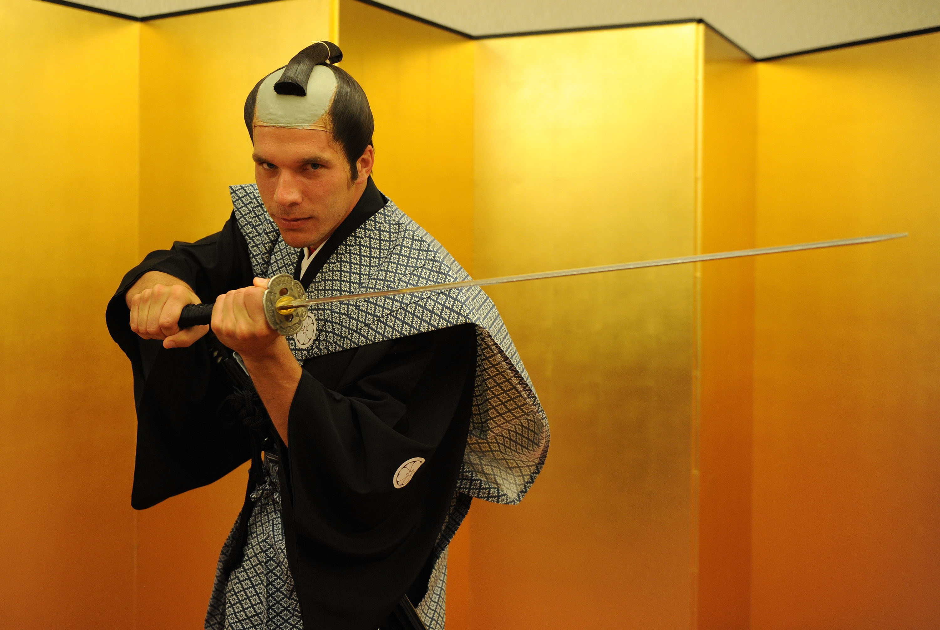 SAITAMA, JAPAN - JULY 25: (EXCLUSIVE COVERAGE) Lukas Podolski of Arsenal FC poses dressed as a Samurai Warrior in the Urawa Royal Pines Hotel in Japan for the club's pre-season Asian tour on July 25, 2013 in Saitama, Japan. (Photo by David Price/Arsenal FC via Getty Images)